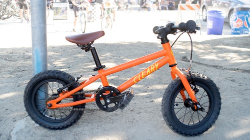 The 13-pound Cleary Gecko is a kids’ bike that comes with the goodies you’d expect on a performance adult rig: V-brakes, three-piece cranks, a faux leather saddle, and a lifetime warranty.
