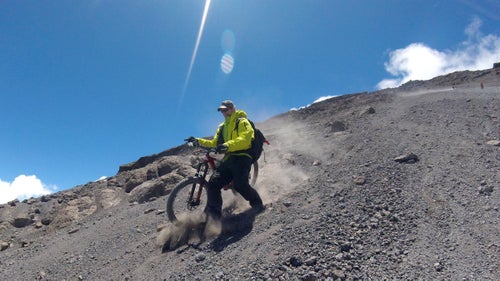 It was clear when Rusch took a nasty spill, nearly dislocating her thumb, that the last descent was going to be the most treacherous. The trail to the bottom of the mountain was nothing but deep ruts carved by running water and aging Land Rovers. It was like we were biking down a bobsled track filled with ball bearings and razor blades.