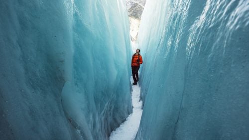 Franz Josef Glacier, and its neighboring Fox Glacier, are popular tourist destinations.They flow nearly to sea level, making them some of the easiest glaciers to reach via foot in the world. Franz Josef Glacier, pictured here, stretches nearly seven miles along New Zealand’s South Alps. Lolos took guided tours of both glaciers in May, which is late autumn in New Zealand. He took a helicopter to the top of the Franz Josef Glacier to explore the bright blue caves and crevasses for a couple hours. “It was another world,” says Lolos. “We were like kids in a playground we’d never seen before.”