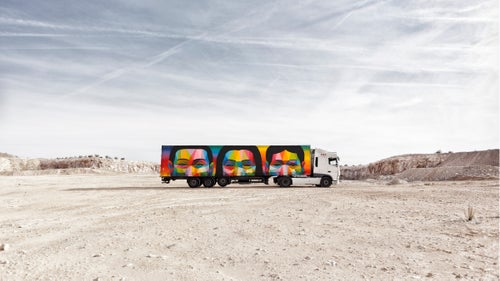 Long hauls to the mountains can get boring. More often than not, any beautiful landscape outside the car window is blocked by a huge serving of McDonald’s fries plastered on the side of a semi-truck. Now, a new project in Spain is transforming these eyesores into something people will actually want to look at. For the Truck Art Project, some of Spain’s best contemporary artists are partnering with commercial shipping company Palibex to convert 100 out-of-service trucks into moving canvases. The project launched with 10 trucks this February, with plans to introduce more this year.
Photo: One of the trucks designed and painted by the Madrid-based artist Okuda San Miguel. San Miguel started as a street artist and gained a quick following for his style of multicolored geometric structures, which he calls pop surrealism.