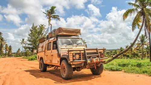 Many of us dream about buying a Land Rover and seeing the world. Graeme and Luisa Bell, along with their two kids, Keelan, 16, and Jessica, 11, actually did it. Since 2009, the family, originally from South Africa, has driven more than 100,000 miles in their 2003 Land Rover Defender 130 diesel. They’ve visited 29 countries, road-tripped across southern and eastern Africa, circumnavigated South America, and driven from Argentina to Alaska and back down to Mexico. They’re currently in Baja, Mexico, and headed for the U.S. After touring the Southwest, they plan to cross to Europe and drive to Asia. We had them email us some photos so we could find out more about their trip and their trusty rig.
Photo: We bought the Land Rover Defender in 2009 in anticipation of an overland journey from Cape Town to Kenya. Here’s the Landy in Mozambique during the first leg of that journey.