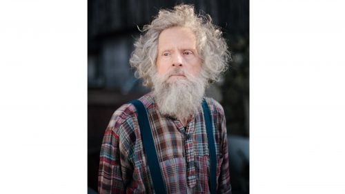 Famous artist and adventurer, Trondur Patursson, in Kirkjabøur on Streymoy Island. Trondur is known around the islands for his glass birds, which you can see everywhere from town halls to people's living rooms. In 1976 Trondur sailed a transatlantic voyage in a replica 6th century leather-hulled ship.