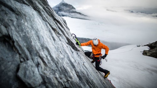 After a couple mugs of coffee, Kyle Dempster’s itchy feet and inquisitive nature led him on an exploratory mission up the granite wall a few hundred yards from the hut.