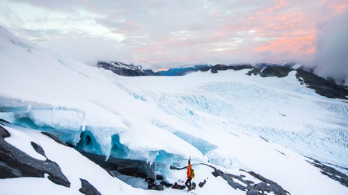 As the last light faded from the sky, the white clouds that had shrouded us during the descent lifted and revealed the expansive and intricate rippling of the glacier below, allowing us to pick a route back to the alpine hut where we would spend the night.