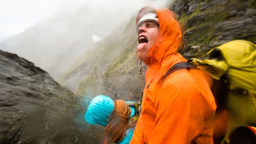 The rain settled in to accompany us for the rest of the day. The steady drizzle turned the slabs around us into a series of cascades, forcing us to set up rappels.