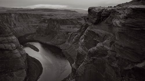Taken in Horseshoe Bend, Arizona, the aim of this image is to reveal a stark contrast between the softness of the water and the severe, coarse face of the rocks that surround the river and have done so for centuries.