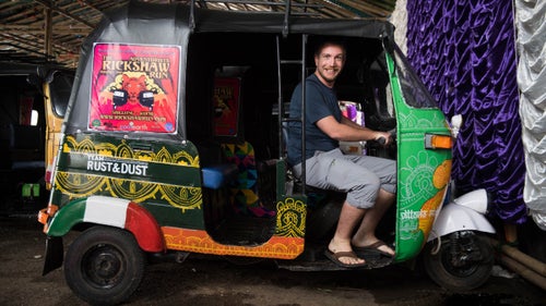 Conz the day before the start of the Rickshaw Run in Shillong, India. We were getting familiar with our Rickshaws and finishing the paint job.
