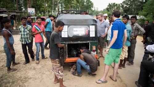 The first of our many breakdowns. After days and at least five different mechanics, we figured out that a new carburetor was in order. Every time we stopped, a small crowd gathered around. Fun at the beginning, tiring after a while.