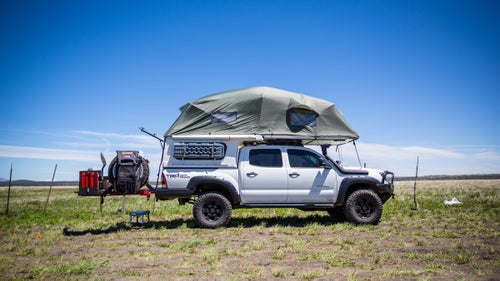 Jon Burtt, 32, runs a food truck out of an old Airstream in Denver, Colorado, but we were more interested in his 2015 Tacoma. He turned a stock TRD Off Road into the beast you see here by adding Pelfreybilt front and rear bumpers, a four-inch lift, custom drawers, and other toys like the FRP Flip-Pac camper shell.