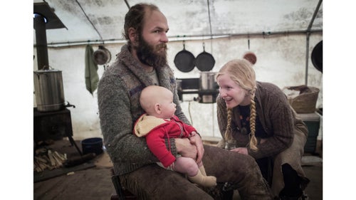 Alex, Epona, and their son relax in a wall tent after a day of scavenging buffalo parts. Buffalo Bridge sets up a tent camp on a landowner’s property near Gardiner, Montana for the duration of the annual hunt.