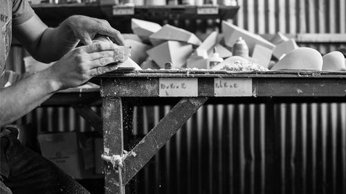Pinches. Slopers. Jugs. Baby heads? Ever stop to wonder who makes the holds bolted to the wall at your local climbing gym? These guys do. Starting with blocks of foam and working in showers of dust, they craft the pieces of the puzzles we love to solve after work and on rainy weekends.