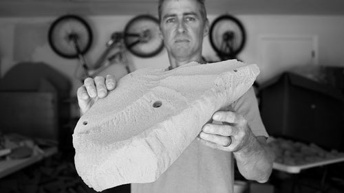 Louie Anderson is an accomplished outdoor climber, guidebook author, gym owner, route setter, and master shaper. He thinks a lot about the relationship between indoor and outdoor climbing. The outdoor climber in him wants holds that mimic real rock, while the route setter in him wants holds that draw climbers to a wall. When designing a new line like his recent set of granite holds, he often starts with a centerpiece shape, a large form that will attract climbers to and advertise the feel of a route.