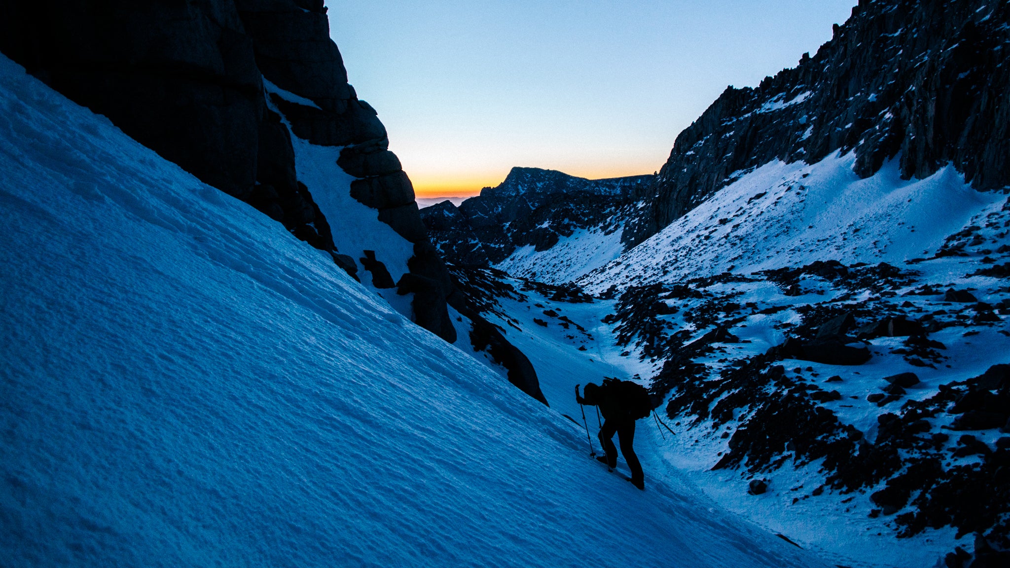 A mountaineer begins the summit of Mt. Whitney. 