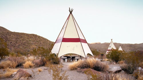 Near Lajitas, Texas, FM-170. This is one of the most remote rest areas in the country. These teepees are hidden just outside Big Bend National Park, right on the Rio Grande, which divides the U.S. and Mexico. As we were shooting, a pack of javelinas ran by.