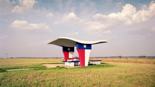 When photographer Ryann Ford moved to Texas in 2007, she began driving across the state, accepting photography assignments in every corner. Ford would take the quickest, main highways on her way there and look for the more scenic routes on the way back. This is where she found remnants of America’s beautiful and often crumbling rest stops. Due to the recession of the late 2000s, many of these great pieces of Americana were destroyed or left to decay. Ford made it her mission to capture as many as she could before they were gone. Her latest book, The Last Stop, is a stunning collection of charismatic rest stops across the country. Here, Ford shares some of her favorites and a few stories from the road. Photo: Flower Mound, Texas, I-35. This was the rest stop that inspired the project. As I researched rest stops to see what was beyond the Austin area, I was excited to find a photo of this one, and then shocked to read it would soon be demolished. The next weekend, I drove four hours north to shoot it. Sure enough, it was demolished a few weeks later.