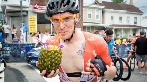 In April, hundreds of cyclists lined up for the United States' most prestigious cycling event, the Philadelphia International Championship. The annual race brings top-notch talent and loads of crazy fans, who come to drink and cheer on the riders. Here are our favorite scenes from Pennsylvania's greatest bike party.To the crowd's delight, Rally Cycling’s Brad Huff grabbed a particularly exotic adult beverage on his last trip up the Wall and crossed the line no-handed, sipping away. Only in Philly.
