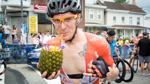 In April, hundreds of cyclists lined up for the United States' most prestigious cycling event, the Philadelphia International Championship. The annual race brings top-notch talent and loads of crazy fans, who come to drink and cheer on the riders. Here are our favorite scenes from Pennsylvania's greatest bike party.To the crowd's delight, Rally Cycling’s Brad Huff grabbed a particularly exotic adult beverage on his last trip up the Wall and crossed the line no-handed, sipping away. Only in Philly.