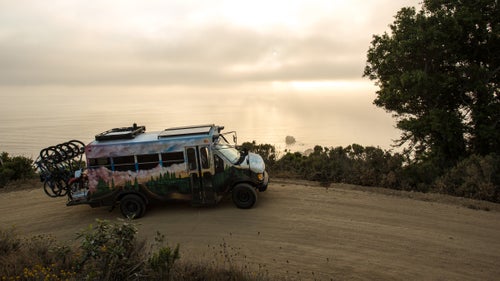 Professional mountain biker Andrew Taylor (sponsored by brands including Adidas, Norco, Gravity, Bell, Kenda, and Smith) knew he wanted to hit the open road. Originally he thought he’d buy a classic VW bus, but then he found this 1994 Ford E350 short bus for $2,000 on Craigslist. It was near perfect, with lots of cargo space and a powerful 7.3-liter diesel engine, and he spent the past six month customizing it. We recently caught up with Taylor in Big Sur, California to talk about the conversion and to ask where he plans to take his new home on wheels.