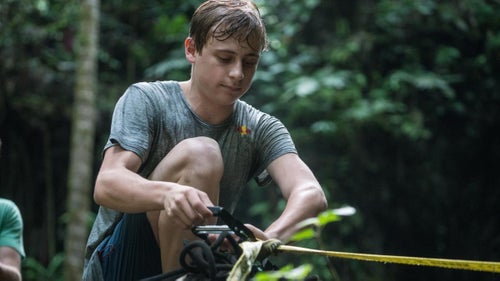 Mason rigs the course with Gibbon Slacklines. After the project was complete, he gave his slacklines to two local kids. “He just said, ‘You probably need these more than I do,’” recounts Lewis, his mentor.