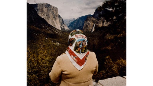 This image of a woman in a scarf looking out on Yosemite was part of Roger Minick’s series on sightseers, in which he made many candid-style shots of people experiencing America’s parks, and often the colorful and themed clothing they would wear on their visit.