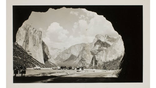 An unknown photographer captures Yosemite Valley from the tunnel view. The introduction of the Kodak camera in 1888 made photographing America’s parks more accessible for the average tourist, however, the entire camera needed to be sent in for the photos to be developed and loaded with new film.