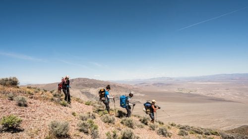 The group approaches the top of Cyclops Canyon in the Funeral Mountains. May 3, 2016.
Swaney’s not the only one exploring remote canyons in Death Valley. He’s not the first one, either. But nobody has documented as many Death Valley first descents as he has. By his count, Swaney has personally led or partnered on 203 of the 258 first descents in the park. Klaus Gerhart, owner of Uber Adventures, a canyoneering store in Los Angeles, hosted a lecture in September 2015 called “Scott Swaney: Master of First Descents.”