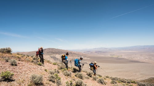 The group approaches the top of Cyclops Canyon in the Funeral Mountains. May 3, 2016.
Swaney’s not the only one exploring remote canyons in Death Valley. He’s not the first one, either. But nobody has documented as many Death Valley first descents as he has. By his count, Swaney has personally led or partnered on 203 of the 258 first descents in the park. Klaus Gerhart, owner of Uber Adventures, a canyoneering store in Los Angeles, hosted a lecture in September 2015 called “Scott Swaney: Master of First Descents.”