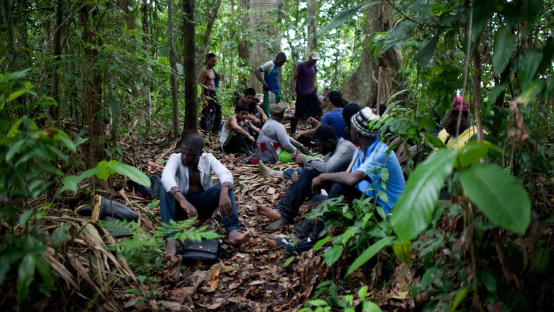 Migrants resting in the jungle.