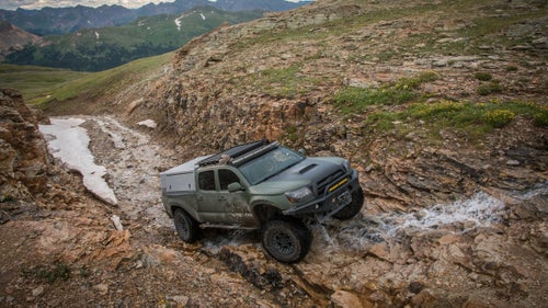 You might have seen more Toyota four-wheel drives than normal on the roads around Ouray, Colorado, this past week. That’s because the town just hosted the annual FJ Summit, where Toyota owners gather with their FJ Cruisers, Tacomas, and 4Runners to drive the area’s many scenic high-alpine passes. Benjamin Kraushaar, a photographer based in Durango, Colorado, hopped in for a ride over Imogene and Black Bear Passes, and then spent time in town making portraits of vehicles and their owners.
Photo: Walt Wagner III, owner of Tactical Application Vehicles in Albuquerque, New Mexico, climbs to the summit of Black Bear Pass in his 2009 Toyota Tacoma TRD Sport. The truck has lots of modifications, including All-Pro Off-Road bumpers, sliders, skid plates, and ARB lockers. It’s a dedication build for Wagner’s late cousin, who was an army ranger on a long-range surveillance detachment.