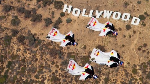 Aikins, a longtime member of the Red Bull Air Force athlete team, has performed stunts in feature films including Godzilla and Iron Man 3. Here, he and three other Red Bull team members—Jon Devore, Miles Daisher, and Mike Swanson—pilot wingsuits over the famed Hollywood sign in California in 2011.