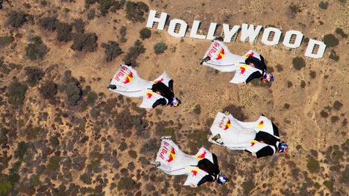 Aikins, a longtime member of the Red Bull Air Force athlete team, has performed stunts in feature films including Godzilla and Iron Man 3. Here, he and three other Red Bull team members—Jon Devore, Miles Daisher, and Mike Swanson—pilot wingsuits over the famed Hollywood sign in California in 2011.