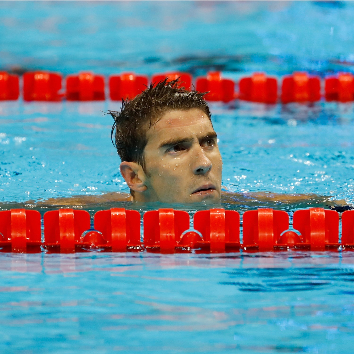 RIO DE JANEIRO, BRAZIL - AUGUST 10: Michael Phelps of the United States reacts in the second Semifinal of the Men's 200m Individual Medley on Day 5 of the Rio 2016 Olympic Games at the Olympic Aquatics Stadium on August 10, 2016 in Rio de Janeiro, Brazil. (Photo by Clive Rose/Getty Images)