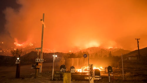 The Blue Cut Fire burns in San Bernardino County on the evening of August 16, 2016.
Palley drives a 2007 Ford Expedition EL because he needed something big enough for all his gear and to sleep in. For camera gear, he tries to go light so he’s mobile. His regular kit includes a Nikon D5, a Nikon 810, a zoom lens, and a wide lens. If he needs to go super light he just carries the D5 and a 35mm f/2.0.