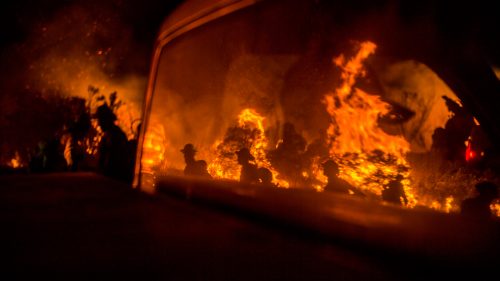 The Border Fire burns near Campo and Potrero Wednesday in San Diego County, California.
Palley’s never felt like he was in real danger. But he’s had to move fast when a fire changed direction. Last week he saw documentary film crew members lose a car when they couldn’t move it fast enough.