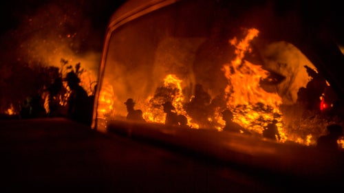The Border Fire burns near Campo and Potrero Wednesday in San Diego County, California.
Palley’s never felt like he was in real danger. But he’s had to move fast when a fire changed direction. Last week he saw documentary film crew members lose a car when they couldn’t move it fast enough.