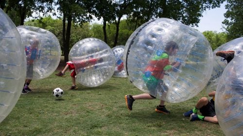 It's not surprising that kids playing Bubble Soccer at a birthday party often spend more time trying to knock over their friends than actually chasing the ball.