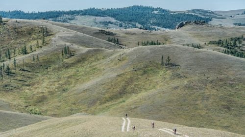 Four riders bomb down the doubletrack on Stage 2, the hardest of the race with 8,000 feet of climbing. It took the lead trio five hours and 15 minutes to finish.