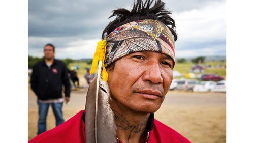 I first made the 1,600-mile journey from Berkeley, California, to the Standing Rock Sioux Reservation in late August and again in early September to document this latest skirmish in the fight to shield fresh water from pollution, to keep fossil fuels in the ground, and to ensure greenhouse gasses stay out of the atmosphere. When I arrived, I realized there are two major stories unfolding here on the windswept prairie of North Dakota. One of them, the one that has drawn the most media attention, plays out in rallies and hashtags, Facebook Live streams, and confrontations with pipeline security workers. The other is more difficult to see unless you visit the camp itself, where old friends and long estranged tribes have reunited, and people share songs, prayers, and stories as they articulate a future in which tribal lands are no longer national sacrifice zones and the zero-sum logic of industry is not taken for granted. Photo: For nearly six months, Frank Archambault of the Standing Rock Sioux has camped with other protesters on the edge of his tribe’s reservation, near where the Dakota Access Oil Pipeline would plunge under the Missouri River. A single father of five, he’s concerned that if the pipeline bursts or leaks, it will pollute the Missouri, poisoning the source of Standing Rock’s water and potentially sickening his kids.