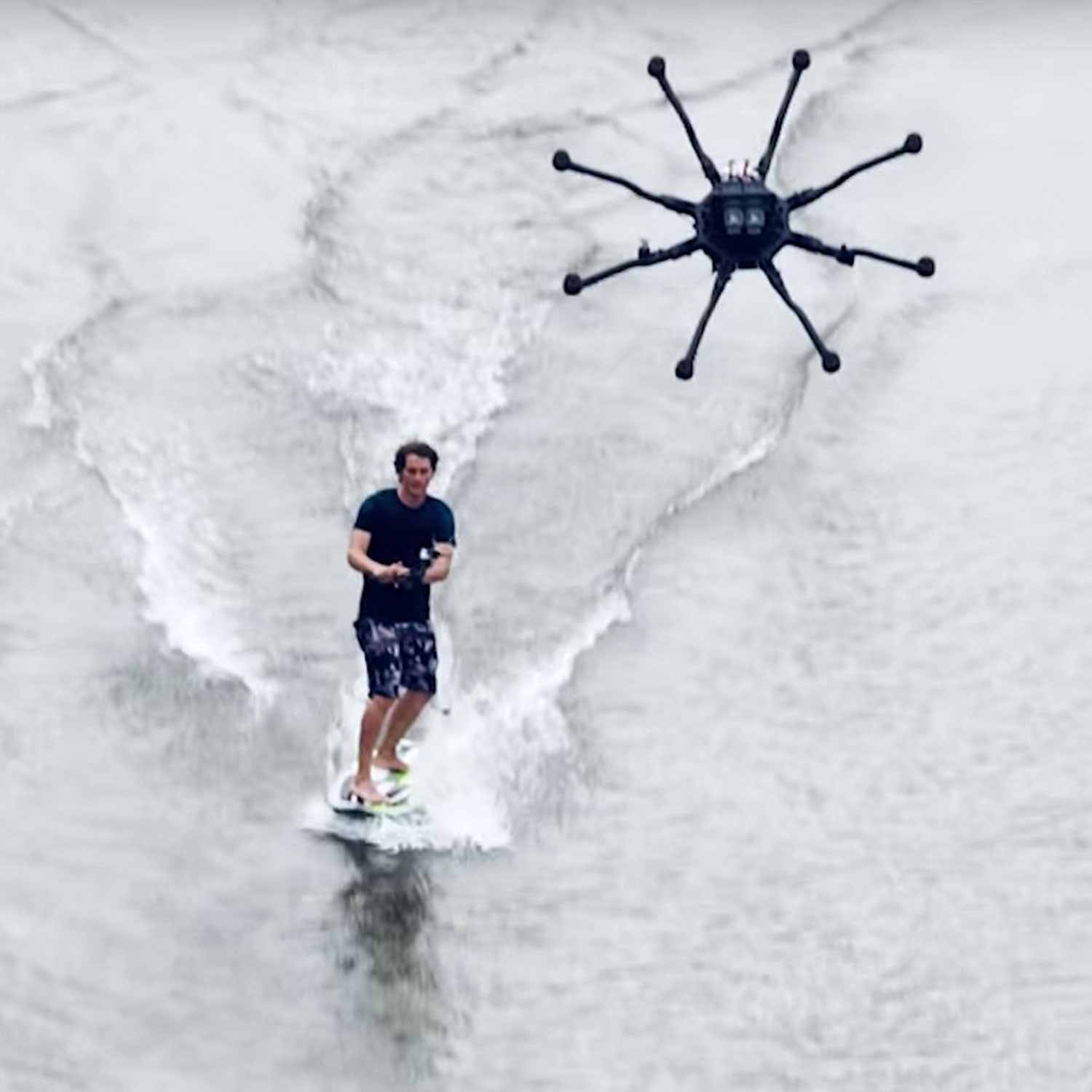 Is this drone surfing video a glimpse of the future or just a goofy one-off experiment?