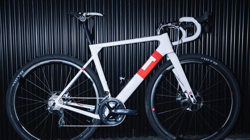 After years of incremental changes, the road bike market is in serious flux. Gravel and adventure riding has taken off, and manufacturers are racing to cash in. If that sounds cynical, consider this: while road bikes marketed toward off-road use were a small niche just a year or two ago, almost every brand at the show had at least one wide-tire roadie this year. So yeah, there’s a bit of a land-grab happening.
Meanwhile, the plus- and fat-tire trend from mountain bikes is spilling onto the pavement. And road disc brakes continue to evolve, with most manufacturers pushing their road lines in that direction, despite the UCI’s dithering on the subject. All combined, these changes have created one of the most exciting times in road-bike development that I can remember in the last decade. And it’s resulting in some cool and sometimes truly oddball new bikes.
Photo: 3T Exploro
If I could ride just one road bike from the show this year, it would be the Exploro, which is a close relative to last year’s Gear of the Year-winning Open UP. Both bikes were developed by Gerard Vroomen, who started Cervélo, which explains the similar geometries and shared ability to accommodate both 650b and 700c wheels. The carbon Exploro is tighter and a bit more aggressive, and, most importantly, it is optimized to cheat the wind. An aero gravel bike might sound like a weird idea, but it actually makes a lot of sense, given that in races like the Dirty Kanza you often spend 100 or more miles riding alone, where watts saved will benefit you enormously. The Exploro will sell as a frame and fork combo only and come in two layup configurations: a high-end Team model for $3,000, and a no-expense-spared, as-light-as-you-can-get limited edition for $4,200.