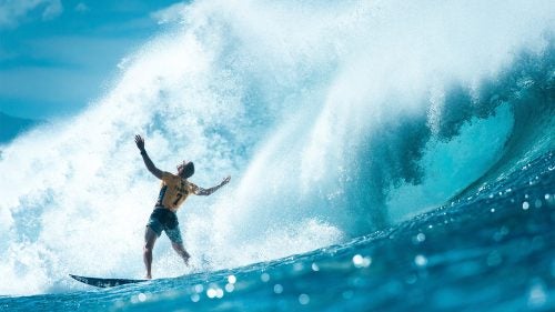 Spirit category finalist by Corey Wilson
Surfer Mick Fanning competes on the final day of the Pipeline Masters on the north shore of Oahu in 2015. “Early that morning Mick got the terrible news that his brother had passed away,” Wilson says. “This is the last thing I had ever expected because Mick had already had the worst year ever—shark attack, divorce, and now this.”