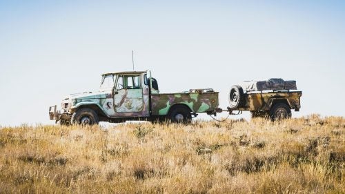 Rob Tygart, from Yucaipa, California, in his 1967 FJ45, towing a 1967 MF16 military trailer.
