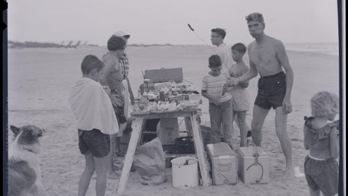 A family enjoys a picnic at Cape Hatteras National Seashore, in North Carolina, in 1956. The NPS saw a huge influx of visitors in the 1950s following World War II.