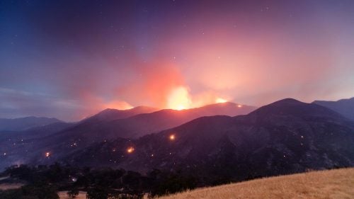 The Soberanes Fire at night. What began as an ember from an illegal campfire near Salinas turned into the most expensive fire in U.S. history, costing more than $210 million. At its peak, the fire was assigned more than 5,000 personnel, in part because of its proximity to the Monterey Peninsula and California wine country.