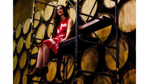 Fonseca grew up riding horses and tending sheep in Guadalajara’s highlands. “I’m still a cowgirl sometimes,” she says, though she’s now Patrón’s executive tour host and brings restaurant owners and chefs from all over the world to the Hacienda. The company produces roughly two million cases of tequila per year.
Draped Geometric dress by DKNY ($545); Suede Fringe boots by Polo Ralph Lauren ($398)