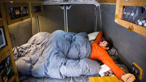 Honnold in his new, larger bed. He slept at an angle in the old Ford van because the bed wasn’t quite long enough. The new bed also has sheets and a comforter instead of just a sleeping bag on top. “When I moved into a real bed like this, I was like, ‘This is quite a bit more comfortable than a sleeping bag.’ It makes me a little concerned that I’m getting soft, though, and that this is so indulgent.”