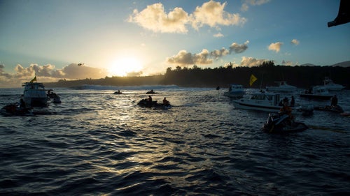 On Friday, November 11, with a solid swell that surpassed 30 feet, the World Surf League called its first big-wave contest of the Pacific Northwest swell season at Pe'ahi, aka Jaws, in Maui. This was the second time the competition was run, but this year was different: it included the first-ever female surfers to compete in a WSL big wave event.
San Francisco surfer Bianca Valenti, the designated WSL athlete representative in charge of coordinating with surfers about the event, and I flew out to join the participants: 12 women hailing from South Africa, Australia, Guatemala, Brazil, Hawaii and mainland U.S.. They competed in two 45-minute preliminary heats and an hour-long final on the same day as the men’s contest—a victory for women’s surfing on the heels of lobbying efforts from female surfers and pressure pressure from the press to host an all-women event.
Valenti and I stayed with Paige Alms, who famously rode the first barrel ridden by a woman at Pe'ahi in January 2015, and who ultimately took first place in this year’s event. Here’s a look at the historic day, and what it meant to women who made it happen.
Photo: Many surfers paddle out through the rocky shore pound to get to the break at Jaws, though on competition day some chose to conserve their energy and get a ride. The contest attempted to limit the boat and Jet Ski traffic during the contest, but it still looked like Water World out there as the sun rose.