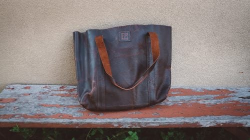 A mammoth main compartment makes this bag functional for everyday carry items. Locally sourced bison leather makes it beautiful.
