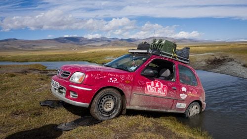 How about this for a vacation idea? Fly to Europe, buy a beat-up clunker, then try to make it from England to Mongolia in one piece. There’s no official route and no official rulebook. Photographer Drew Gurian and his brother, Scott, did just that this summer as participants in the Adventurists’ Mongol Rally. They bought 990ML 60-horsepower Nissan Micras, and after 53 days, 18 countries, a couple broken axles, and an emergency extraction, they crossed the finish line. We talked to to the New York City–based photographer about some of his most memorable times on the road. Photo: Every day brought a different hole that we needed to be pulled out of. Here, our friends and adventure mates Rosi Moore-Fiander and Jane Box help us out of a crossing that proved too deep.