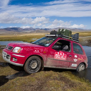 How about this for a vacation idea? Fly to Europe, buy a beat-up clunker, then try to make it from England to Mongolia as fast as you can. There’s no official route and no official rulebook. Photographer Drew Gurian and his brother, Scott, did just that this summer as participants in the Adventurists’ Mongol Rally. They bought 990ML 60-horsepower Nissan Micras, and after 53 days, 18 countries, a couple broken axles, and an emergency extraction, they crossed the finish line. We talked to to the New York City–based photographer about some of his most memorable times on the road. Photo: Every day brought a different hole that we needed to be pulled out of. Here, our friends and adventure mates Rosi Moore-Fiander and Jane Box help us out of a crossing that proved too deep.